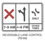 Regulatory Sign "REVERSIBLE LANE CONTROL (R3-9d)" is shown as a horizontal rectangular white sign with a black border. The sign is shown divided horizontally into thirds by two vertical black lines that extend from the upper to lower border. The sign is also divided vertically into two sections by a horizontal black line one-fourth of the way from the bottom border. On the left third of the sign, a large red "X" is shown above the horizontal black line, and the legend "7-9 AM" in black is shown below the line. On the middle third of the sign, a vertical black arrow is shown above the line with two arrowheads: one pointing upward and one on the left curving up and to the left. The legend "4-6 PM" in black is shown below the line. On the right third of the sign, two opposing curving arrows are shown above the line, one pointing upward and to the left, and one pointing downward and to the right. The bases of the shafts of the two arrows are directly in line with each other in the vertical axis. The word "ONLY" in black is shown centered below the arrows. The words "OTHER TIMES" in black are shown on two lines below the horizontal line.