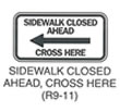 Pedestrian and Bicycle Sign "SIDEWALK CLOSED AHEAD, CROSS HERE (R9-11)" is shown as a horizontal rectangular white sign with a black border and legend. The words "SIDEWALK CLOSED AHEAD" on two lines and "CROSS HERE" are shown in black above and below, respectively, a large left-pointing horizontal black arrow.