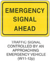Warning Sign "TRAFFIC SIGNAL CONTROLLED BY AN APPROACHING EMERGENCY VEHICLE (W11-12p)" is shown as a horizontal rectangular supplemental plaque with the words "EMERGENCY SIGNAL AHEAD" on three lines.
