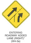 Warning Sign "ENTERING ROADWAY ADDED LANE (RIGHT) (W4-3a)" is shown as a diamond-shaped sign. It shows a diagonal arrow pointing up and to the right. This arrow is to the left of a dividing line that changes from solid to dotted and a curved arrow to the right of the dotted line. This sign was anticipated for inclusion in the 2003 edition of the MUTCD at the time of this printing.