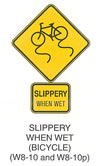 Pedestrian and Bicycle Sign "SLIPPERY WHEN WET (BICYCLE) (W8-10)" is shown as a diamond-shaped yellow sign with a black border. It shows a black symbol of a bicycle at a slight angle pointing down and to the left. Two vertical wavy lines are shown extending down from the bicycle tires. Directly below W8-10p is shown as a horizontal rectangular yellow sign with a black border. It shows the words "SLIPPERY WHEN WET" in black on two lines. 