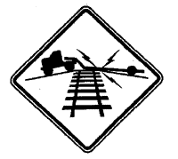 Picture of a truck crossing railroad tracks on a hill