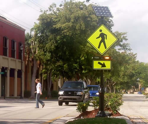 FIGURE 10 Photograph of one of the two installations in Miami Dade County. The device is a median unit shown during activation.