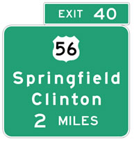 Two road signs on top of each other with green background and white lettering.  The signs read: 1) Exit 40, 2) Interstate 56 symbol followed by Springfield Clinton 2 Miles.