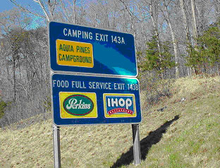 Image shows Full service food logos sharing motherboard with camping logo of Exit 143A and 143B (I-95)