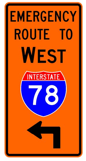 A vertical rectangular single sign with an orange background color.  It includes a black directional arrow above which is a full color Interstate route shield above which is a black cardinal direction word legend above which are the words "Emergency Route To" in black letters.