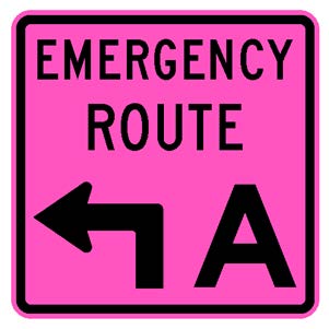 A square single sign with a fluorescent pink background color.  The legend reads "Emergency Route" in black letters at the top of the sign below which is a black directional arrow that has a black upper-case "A" to its right to identify the route.