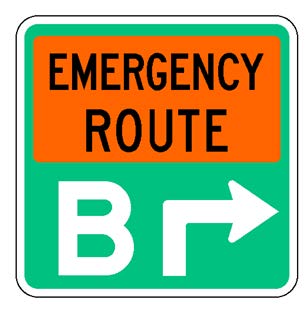 A square single sign with a green background color.  The legend reads "Emergency Route" in black letters within an orange rectangular background panel at the top of the sign below which is a white directional arrow that has a white upper-case "B" to its left to identify the route.