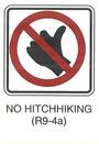 Pedestrian and Bicycle Sign "NO HITCHHIKING (R9-4a)" is shown as a square white sign with a black border and a black symbol of a hand with the thumb extended inside a red circle with a red slash across the symbol.