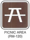 Motorist Services and Recreation Sign "PICNIC AREA (RM-120)" is shown with a symbol of a picnic table.