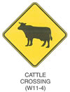 Warning Sign "CATTLE CROSSING (W11-4)" is shown as a diamond-shaped symbol sign with a symbol of a left-facing cow.