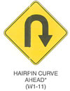 Warning Sign "HAIRPIN CURVE AHEAD (W1-11)" is shown as a diamond-shaped sign with an arrow curving to the right and down to form a semicircle.