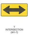 Warning Sign "T INTERSECTION (W1-7)" is shown as a horizontal rectangular sign with a large horizontal double-headed arrow.