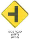 Warning Sign "SIDE ROAD (LEFT) (W2-2)" is shown as a diamond-shaped sign. It shows a vertical black line with a horizontal black line extending to the left from the middle of the vertical line.